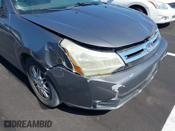 2009 Ford Focus SE with VIN 1FAHP35N19W246382, listed as a IAAI auction lot 42043020 with 197,707 mi miles. Bid and sale history available at carsss.com. Image 6.