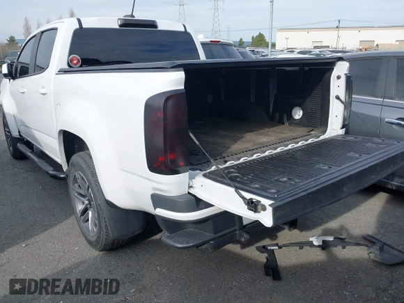 2021 Chevrolet Colorado 2WD Work Truck z VIN 1GCGSBENXM1118310, wystawiony jako IAAI lot #41668804 z przebiegiem 65 295 mil mil oraz . Historia ofert i sprzedaży dostępna na DreamBid. Obrazek 3.