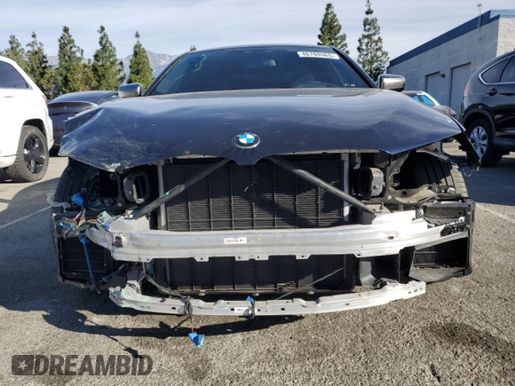 2020 BMW 5 Series M550i xDrive with VIN WBAJS7C06LBN96210, listed as a Copart auction lot 46769365 with 39,710 mi miles and Salvage title. Bid and sale history available at DreamBid. Image 5.