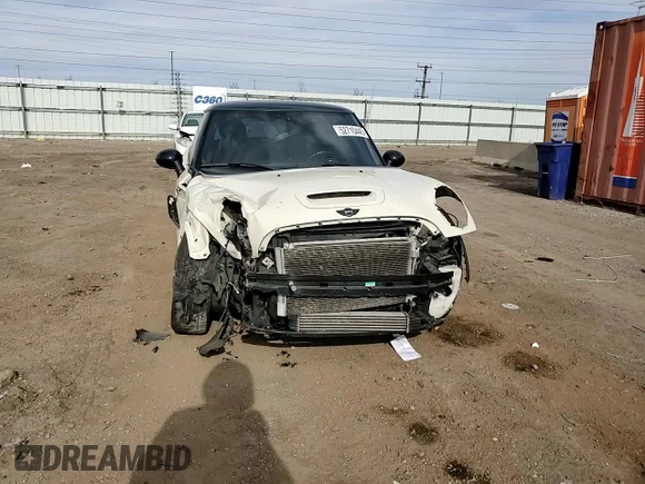 2013 MINI Hardtop S with VIN WMWSV3C54DT478670, listed as a Copart auction lot 52710445 with 58,974 mi miles and Salvage title. Bid and sale history available at DreamBid. Image 11.