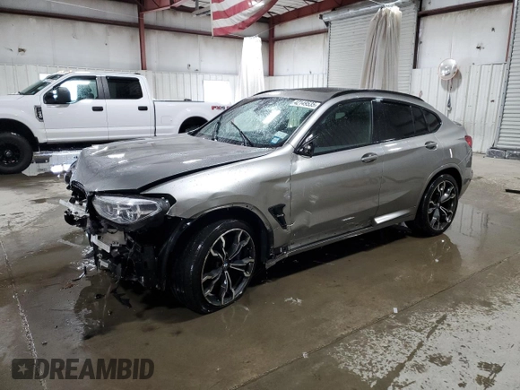2021 BMW X4 M z VIN 5YMUJ0C05M9E04935, wystawiony jako Copart lot #42149535 z przebiegiem Nie podano mil oraz Szkody całkowita. Historia ofert i sprzedaży dostępna na DreamBid. Obrazek 1.
