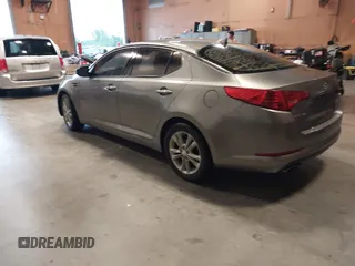 2013 Kia Optima EX with VIN 5XXGN4A74DG165525, listed as a IAAI auction lot 42405482 with 132,820 mi miles and . Bid and sale history available at DreamBid. Image 3.