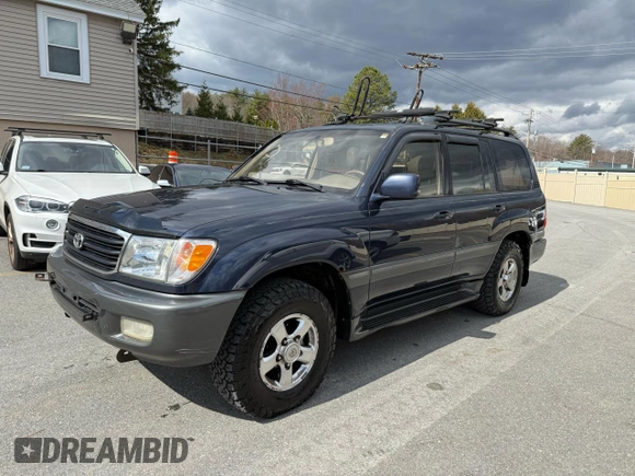 2002 Toyota Land Cruiser z VIN JTEHT05J622022972, wystawiony jako Copart lot #59201475 z przebiegiem 299 548 mil mil oraz Czysty tytuł • Clean title. Historia ofert i sprzedaży dostępna na DreamBid. Obrazek 2.