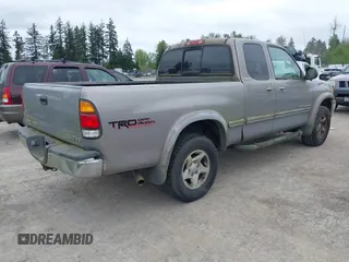 2000 Toyota Tundra Limited with VIN 5TBBT481XYS068716, listed as a IAAI auction lot 42105380 with 281,055 mi miles. Bid and sale history available at carsss.com. Image 4.