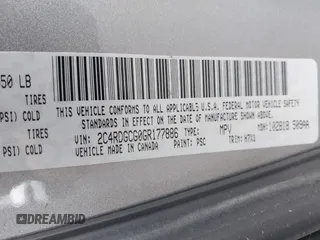 2016 Dodge Grand Caravan SXT with VIN 2C4RDGCG0GR177886, listed as a IAAI auction lot 42138184 with 151,696 mi miles. Bid and sale history available at carsss.com. Image 9.