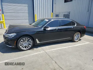 2016 BMW 7 Series 750i with VIN WBA7F0C52GGL99982, listed as a Copart auction lot 64069775 with 56,284 mi miles and Salvage title. Bid and sale history available at DreamBid. Image 1.