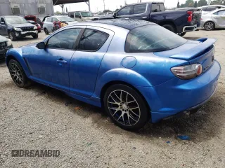 2005 Mazda RX-8 with VIN JM1FE173450144529, listed as a Copart auction lot 56769284 with 0 mi miles and Salvage Title. Bid and sale history available at carsss.com. Image 2.