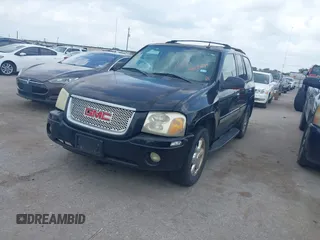 2004 GMC Envoy SLE with VIN 1GKDS13SX42398363, listed as a IAAI auction lot 42154134 with 308,001 mi miles and . Bid and sale history available at DreamBid. Image 2.