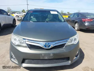 2012 Toyota Camry Hybrid XLE with VIN 4T1BD1FK0CU020723, listed as a IAAI auction lot 42031093 with 121,297 mi miles. Bid and sale history available at carsss.com. Image 12.