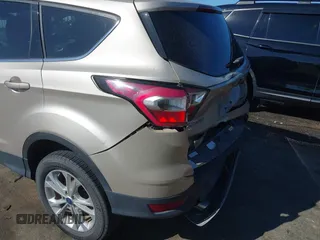 2017 Ford Escape SE with VIN 1FMCU9GD1HUC70823, listed as a IAAI auction lot 41898457 with 86,042 mi miles and . Bid and sale history available at DreamBid. Image 17.