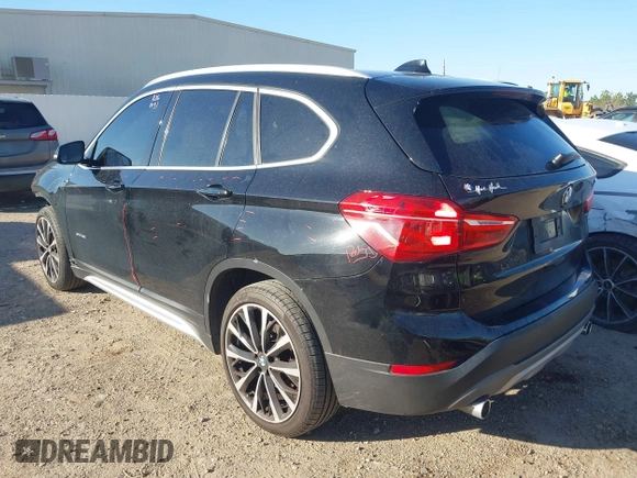 2018 BMW X1 sDrive28i with VIN WBXHU7C30J5L04913, listed as a IAAI auction lot 41755344 with 101,867 mi miles. Bid and sale history available at carsss.com. Image 3.