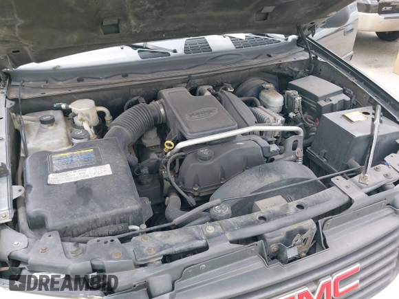 2005 GMC Envoy SLE with VIN 1GKDS13SX52373187, listed as a IAAI auction lot 42434190 with 112,965 mi miles and . Bid and sale history available at DreamBid. Image 10.