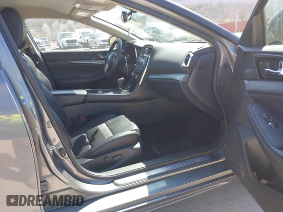 2017 Nissan Maxima SR with VIN 1N4AA6AP4HC453943, listed as a IAAI auction lot 41888527 with 130,577 mi miles and . Bid and sale history available at DreamBid. Image 5.
