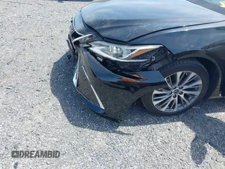 2019 Lexus ES 350 with VIN 58ABZ1B12KU038078, listed as a IAAI auction lot 42143836 with 50,741 mi miles and . Bid and sale history available at DreamBid. Image 6.