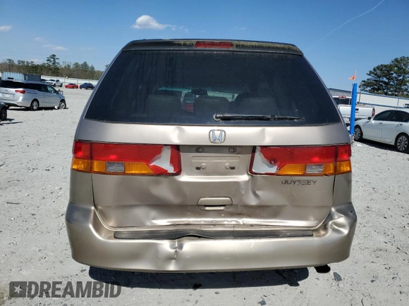 2004 Honda Odyssey EX-L with VIN 5FNRL18974B085790, listed as a Copart auction lot 49159665 with 179,207 mi miles and Salvage Title. Bid and sale history available at DreamBid. Image 6.