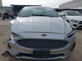 2019 Ford Fusion Titanium with VIN 3FA6P0D9XKR206465, listed as a IAAI auction lot 41577306 with 70,668 mi miles. Bid and sale history available at carsss.com. Image 12.