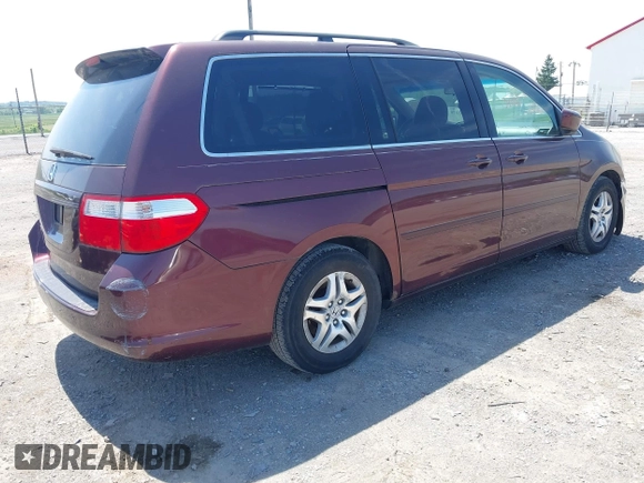 2007 Honda Odyssey EX-L with VIN 5FNRL38717B455291, listed as a IAAI auction lot 42253070 with 222,016 mi miles and . Bid and sale history available at DreamBid. Image 4.