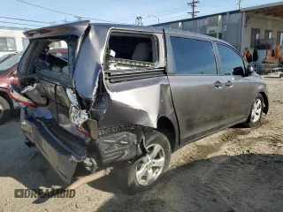 2012 Toyota Sienna with VIN 5TDZK3DC6CS180125, listed as a Copart auction lot 49168735 with 177,951 mi miles and Salvage title. Bid and sale history available at DreamBid. Image 3.