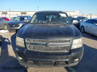 2011 Chevrolet Suburban LTZ with VIN 1GNSCKE00BR353106, listed as a IAAI auction lot 41393001 with 252,968 mi miles. Bid and sale history available at carsss.com. Image 12.