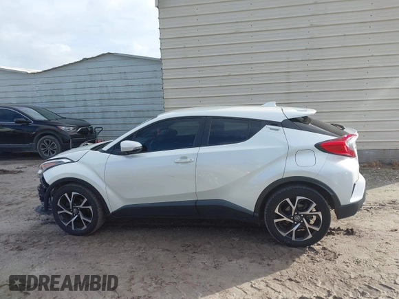 2018 Toyota C-HR XLE with VIN JTNKHMBX3J1010211, listed as a IAAI auction lot 40799443 with 104,148 mi miles. Bid and sale history available at carsss.com. Image 15.