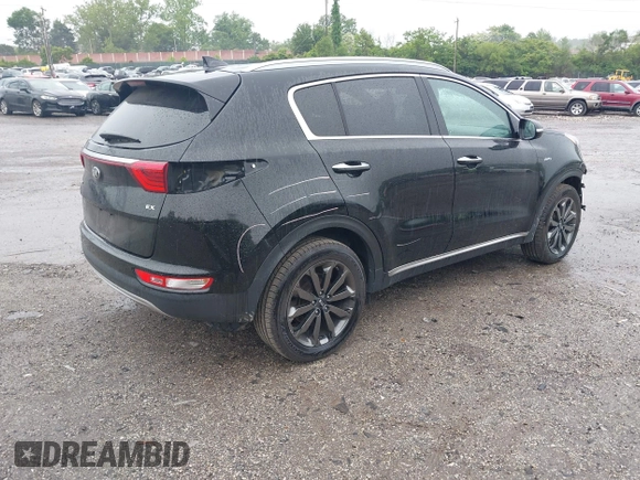 2018 Kia Sportage EX z VIN KNDPNCAC0J7441968, wystawiony jako IAAI lot #42269037 z przebiegiem 113 273 mil mil oraz . Historia ofert i sprzedaży dostępna na DreamBid. Obrazek 4.