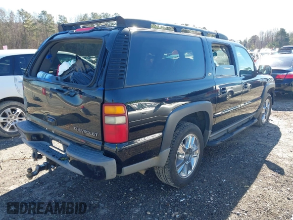 2002 Chevrolet Suburban LT with VIN 3GNFK16Z52G264577, listed as a IAAI auction lot 41881062 with 321,321 mi miles. Bid and sale history available at carsss.com. Image 4.