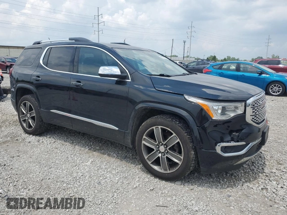 2017 GMC Acadia Denali with VIN 1GKKNPLS9HZ248940, listed as a Copart auction lot 62273455 with 106,016 mi miles and Salvage title. Bid and sale history available at DreamBid. Image 4.