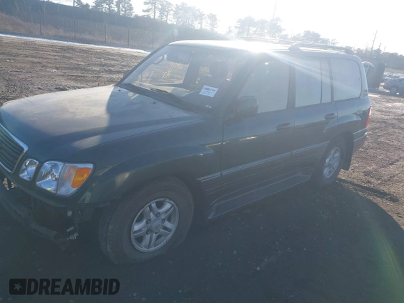 1999 Lexus LX 470 z VIN JT6HT00W9X0031151, wystawiony jako IAAI lot #41436144 z przebiegiem Nie podano mil oraz . Historia ofert i sprzedaży dostępna na DreamBid. Obrazek 2.