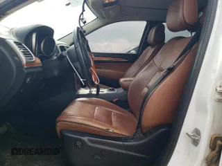 2013 Jeep Grand Cherokee Overland with VIN 1C4RJFCT2DC650336, listed as a Copart auction lot 55455105 with 129,858 mi miles and Clean Title. Bid and sale history available at carsss.com. Image 7.
