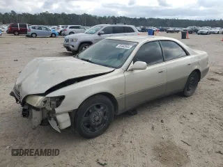 2001 Lexus ES 300 z VIN JT8BF28G710311302, wystawiony jako Copart lot #85463564 z przebiegiem 230 810 mil mil oraz Szkoda całkowita • Salvage title. Historia ofert i sprzedaży dostępna na DreamBid. Obrazek 1.
