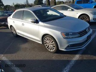 2015 Volkswagen Jetta Sport with VIN 3VWD17AJ5FM220946, listed as a IAAI auction lot 41384898 with 164,172 mi miles and . Bid and sale history available at DreamBid. Image 1.