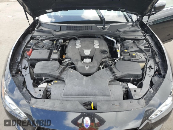 2015 Maserati Ghibli z VIN ZAM57XSA5F1129866, wystawiony jako Copart lot #51738015 z przebiegiem Nie podano mil oraz Szkoda całkowita • Salvage title. Historia ofert i sprzedaży dostępna na DreamBid. Obrazek 11.