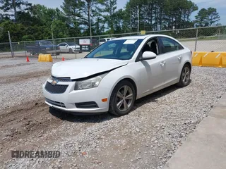 2014 Chevrolet Cruze 2LT z VIN 1G1PE5SB7E7115794, wystawiony jako IAAI lot #42271519 z przebiegiem 160 369 mil mil oraz . Historia ofert i sprzedaży dostępna na DreamBid. Obrazek 2.