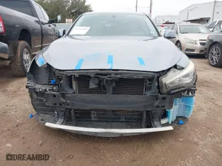2014 Infiniti Q50 with VIN JN1BV7APXEM689997, listed as a IAAI auction lot 41614583 with 138,450 mi miles. Bid and sale history available at carsss.com. Image 6.