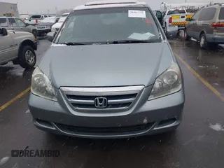 2006 Honda Odyssey EX-L with VIN 5FNRL386X6B096285, listed as a IAAI auction lot 41867716 with 215,284 mi miles. Bid and sale history available at carsss.com. Image 6.