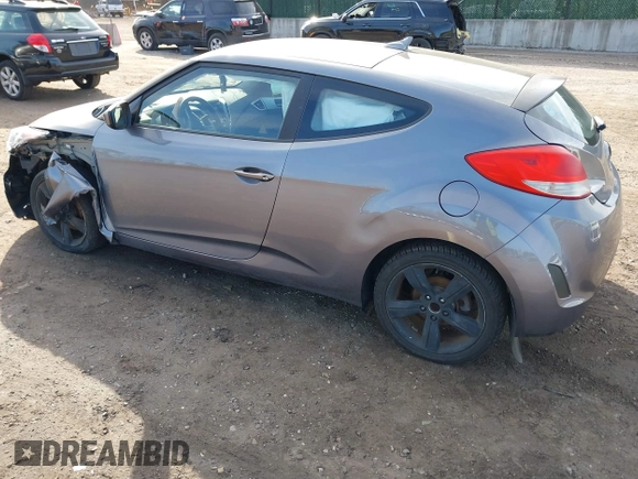 2013 Hyundai Veloster w/Black Int with VIN KMHTC6AD5DU172964, listed as a IAAI auction lot 41768827 with 102,782 mi miles and . Bid and sale history available at DreamBid. Image 3.