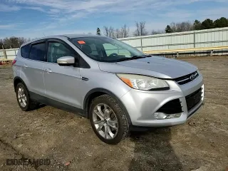 2013 Ford Escape SEL with VIN 1FMCU9HX2DUC66573, listed as a Copart auction lot 43970725 with 145,428 mi miles and Salvage Title. Bid and sale history available at carsss.com. Image 12.