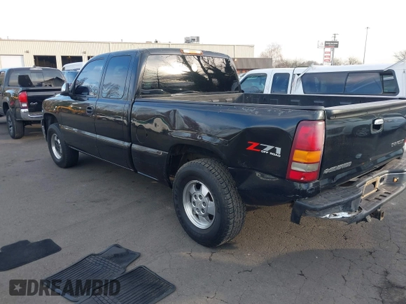 2002 Chevrolet Silverado 1500 LT with VIN 1GCEK19T42E150069, listed as a IAAI auction lot 41401949 with 105,099 mi miles. Bid and sale history available at carsss.com. Image 3.