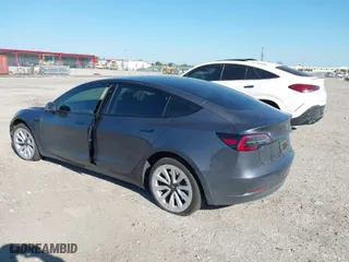 2023 Tesla Model 3 with VIN 5YJ3E1EA2PF642253, listed as a IAAI auction lot 41777160 with 29,817 mi miles. Bid and sale history available at carsss.com. Image 3.
