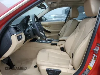 2014 BMW 3 Series 328i xDrive with VIN WBA3B3C59EJ977670, listed as a Copart auction lot 61997165 with 128,937 mi miles and Salvage title. Bid and sale history available at DreamBid. Image 7.