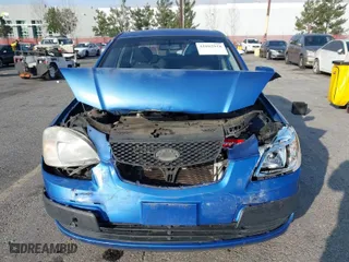 2009 Kia Rio with VIN KNADE223296502151, listed as a IAAI auction lot 41602918 with 143,996 mi miles. Bid and sale history available at carsss.com. Image 6.