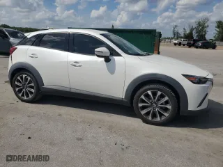 2019 Mazda CX-3 Touring with VIN JM1DKDC78K1446163, listed as a Copart auction lot 50961685 with 65,611 mi miles and Salvage Title. Bid and sale history available at carsss.com. Image 4.
