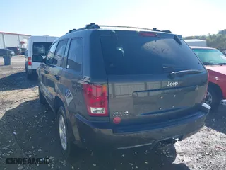 2006 Jeep Grand Cherokee Laredo with VIN 1J4GR48K56C326847, listed as a IAAI auction lot 41972623 with 141,088 mi miles. Bid and sale history available at carsss.com. Image 3.