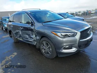 2020 Infiniti QX60 LUXE with VIN 5N1DL0MM2LC539675, listed as a IAAI auction lot 41818936 with 16,877 mi miles. Bid and sale history available at carsss.com. Image 1.