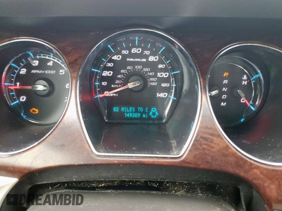 2011 Ford Taurus SEL z VIN 1FAHP2EW6BG183640, wystawiony jako Copart lot #54662745 z przebiegiem 149 309 mil mil oraz Szkoda całkowita • Salvage title. Historia ofert i sprzedaży dostępna na DreamBid. Obrazek 9.