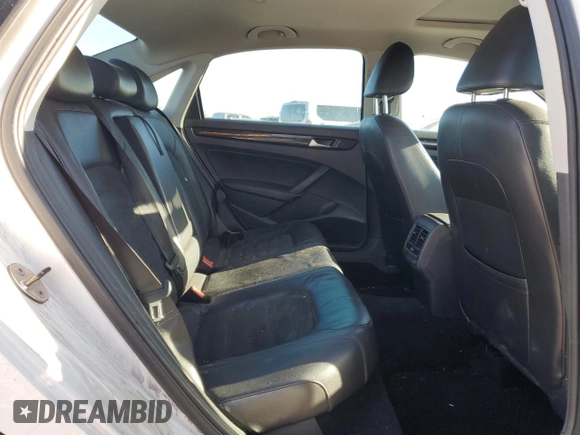 2014 Volkswagen Passat SEL Premium z VIN 1VWCN7A30EC100232, wystawiony jako Copart lot #48228355 z przebiegiem 127 832 mil mil oraz Szkoda całkowita • Salvage title. Historia ofert i sprzedaży dostępna na DreamBid. Obrazek 10.