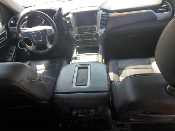 2015 GMC Yukon Denali z VIN 1GKS2CKJ8FR132636, wystawiony jako Copart lot #53567045 z przebiegiem 148 997 mil mil oraz Szkoda całkowita • Salvage title. Historia ofert i sprzedaży dostępna na DreamBid. Obrazek 8.