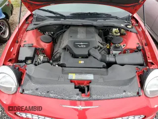 2003 Ford Thunderbird Deluxe z VIN 1FAHP60A13Y105202, wystawiony jako Copart lot #74541534 z przebiegiem 18 518 mil mil oraz Nie do naprawy • Non repairable. Historia ofert i sprzedaży dostępna na DreamBid. Obrazek 11.