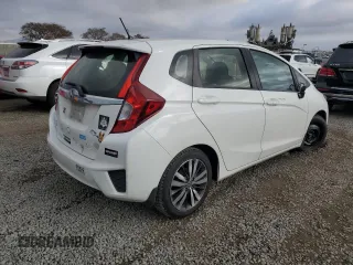 2016 Honda Fit EX-L with VIN JHMGK5H82GS009327, listed as a Copart auction lot 47458075 with 123,251 mi miles and Salvage title. Bid and sale history available at DreamBid. Image 3.