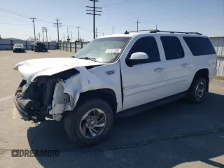2007 GMC Yukon XL SLT z VIN 1GKFK16327J355384, wystawiony jako Copart lot #52161335 z przebiegiem 127 368 mil mil oraz Szkody całkowita. Historia ofert i sprzedaży dostępna na DreamBid. Obrazek 1.